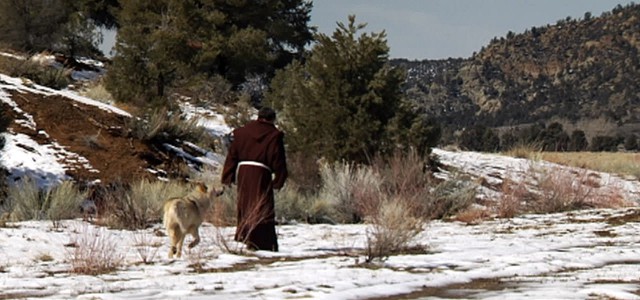 St. Francis walking with the wolf of Gubbio